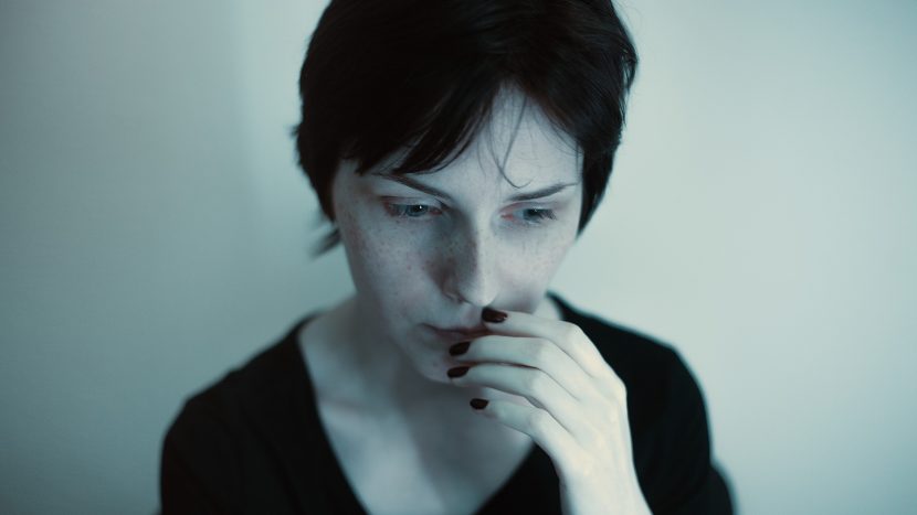 Woman with ADHD thinking - being human