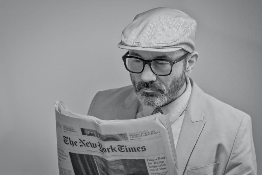 Man reading newspaper