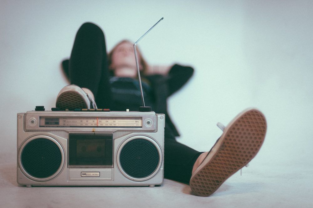 Figure with 1970s radio