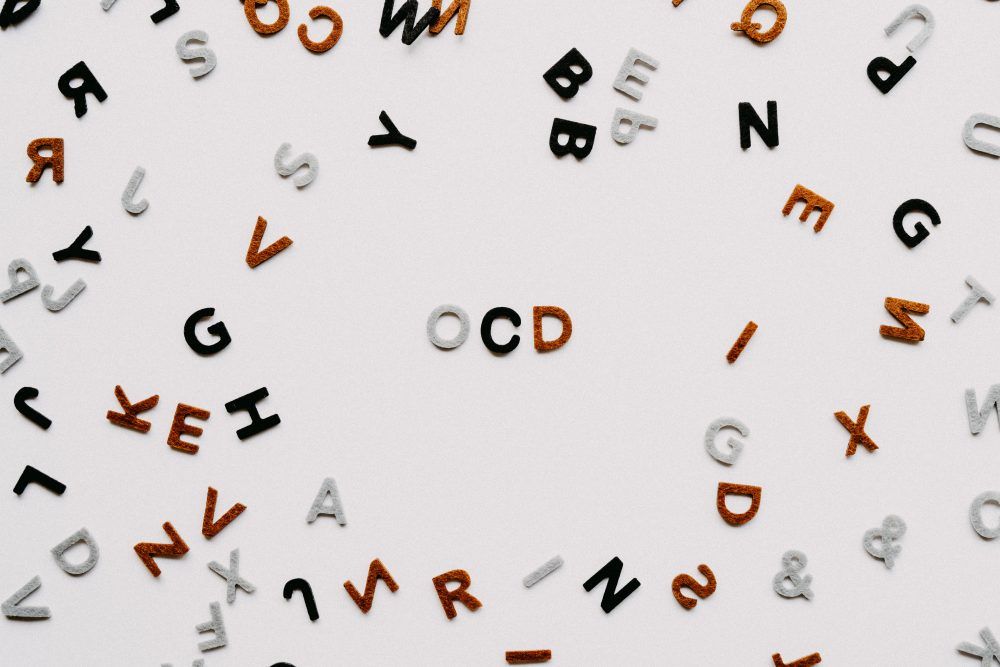 letters on plain background - ADHD and OCD?