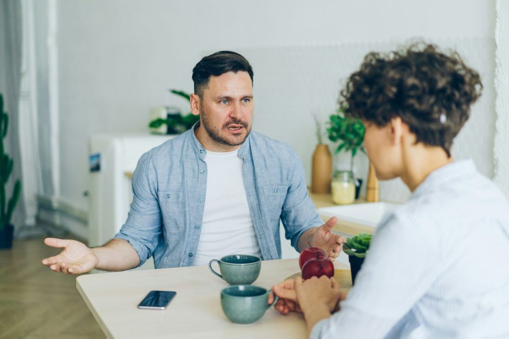 Rudeness vs ADHD two people at a table