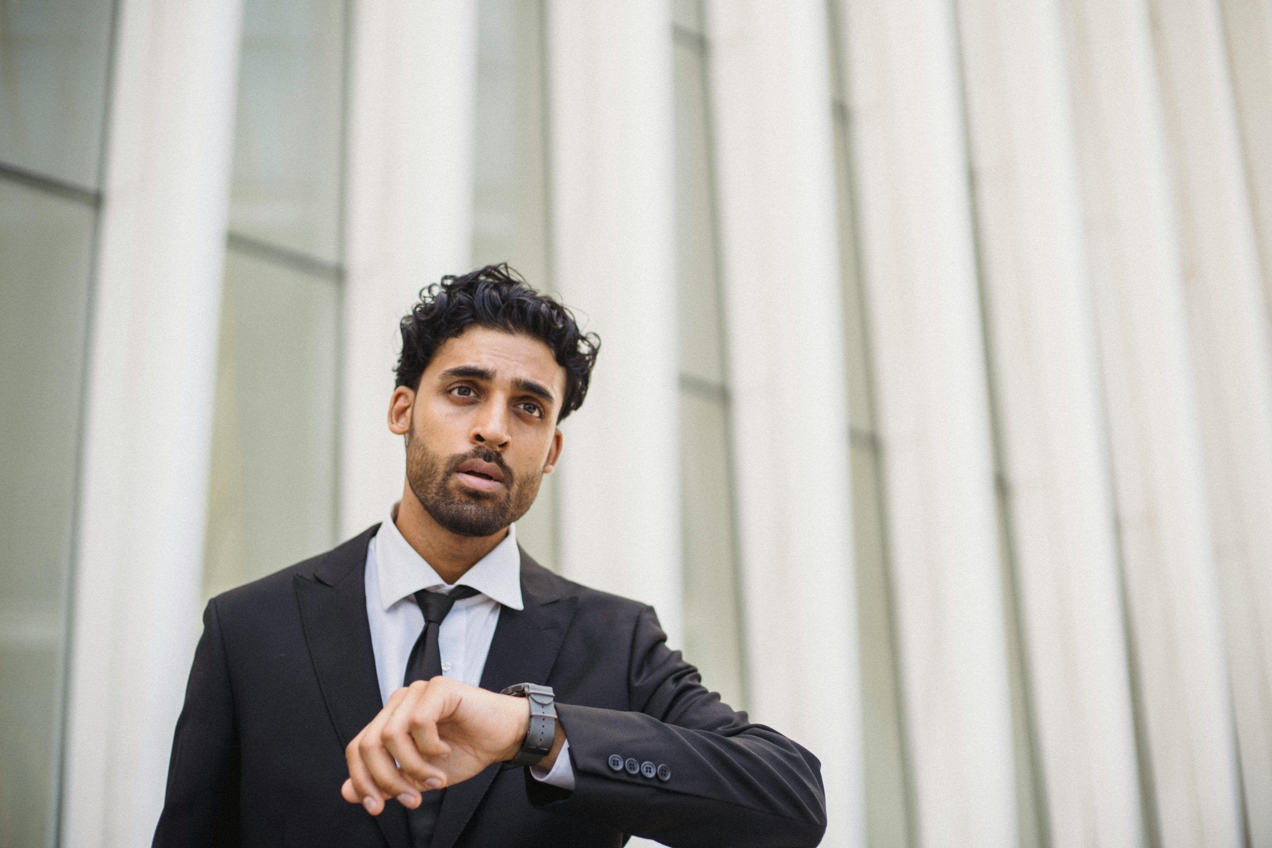 Man looking at watch